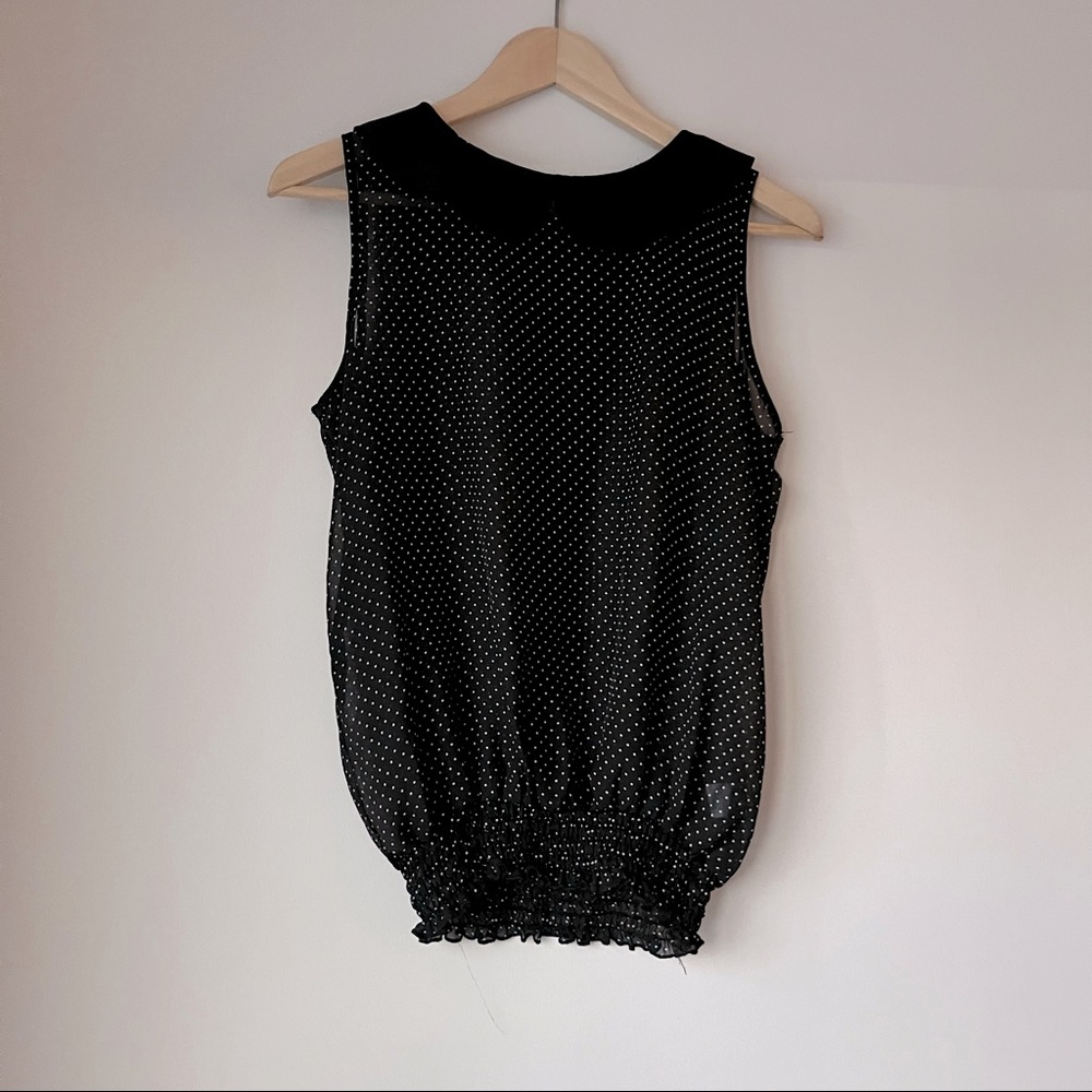 Polka dot sleeveless blouse
